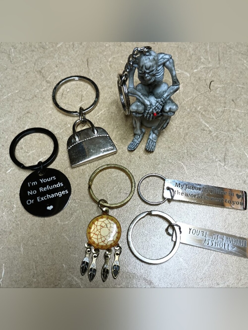 Novelty Keychain Lot with Silver, Black, and Brass Tones